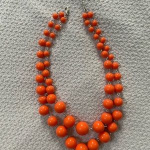 Orange plastic ball statement necklace